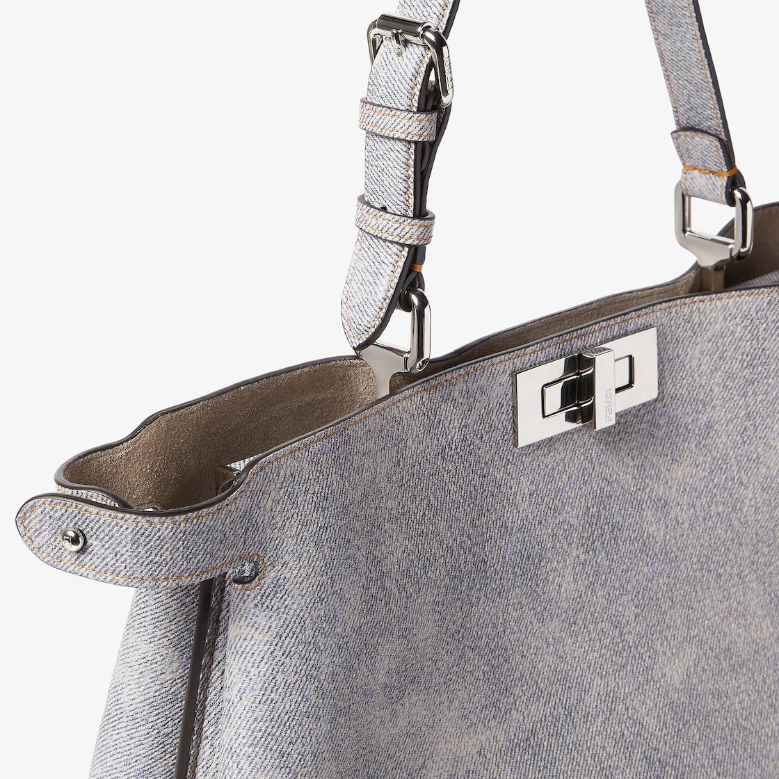 Peekaboo Soft LargeGray leather bag with a faded denim effect. Product Image