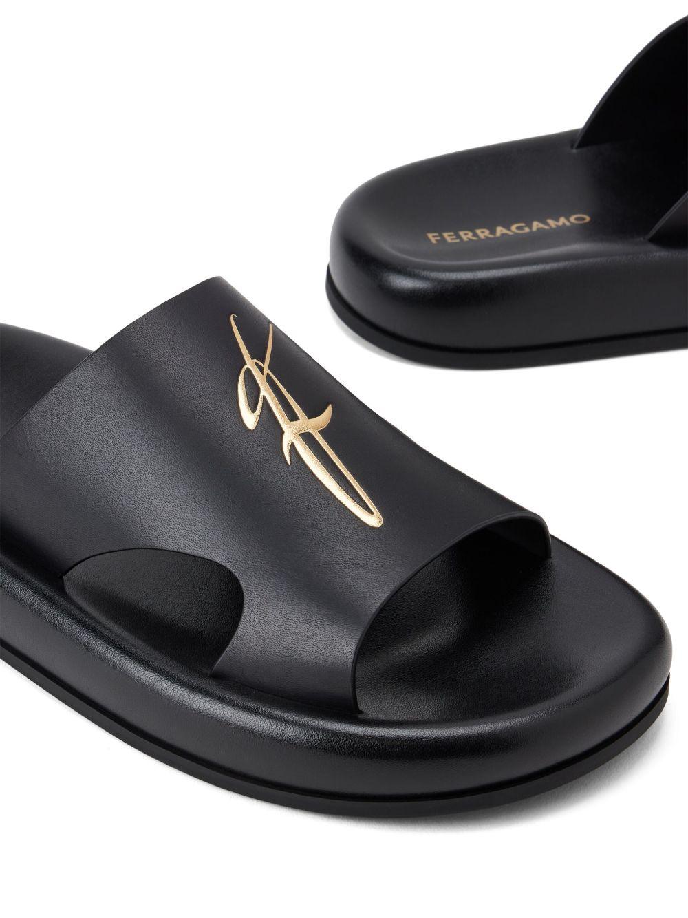 logo-embossed leather slides Product Image