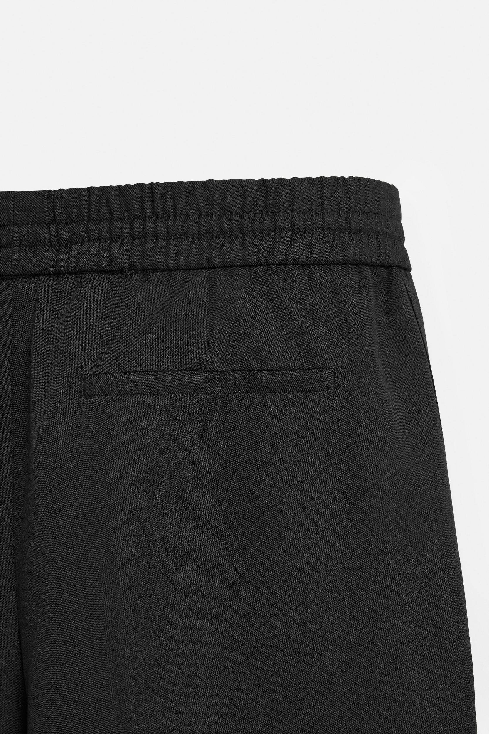 RELAXED FIT PANTS WITH STRIPE Product Image