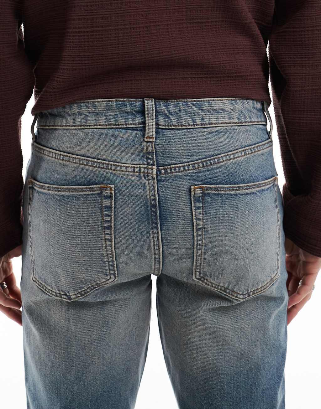 ASOS DESIGN stretch flare jeans in light wash blue with tint Product Image