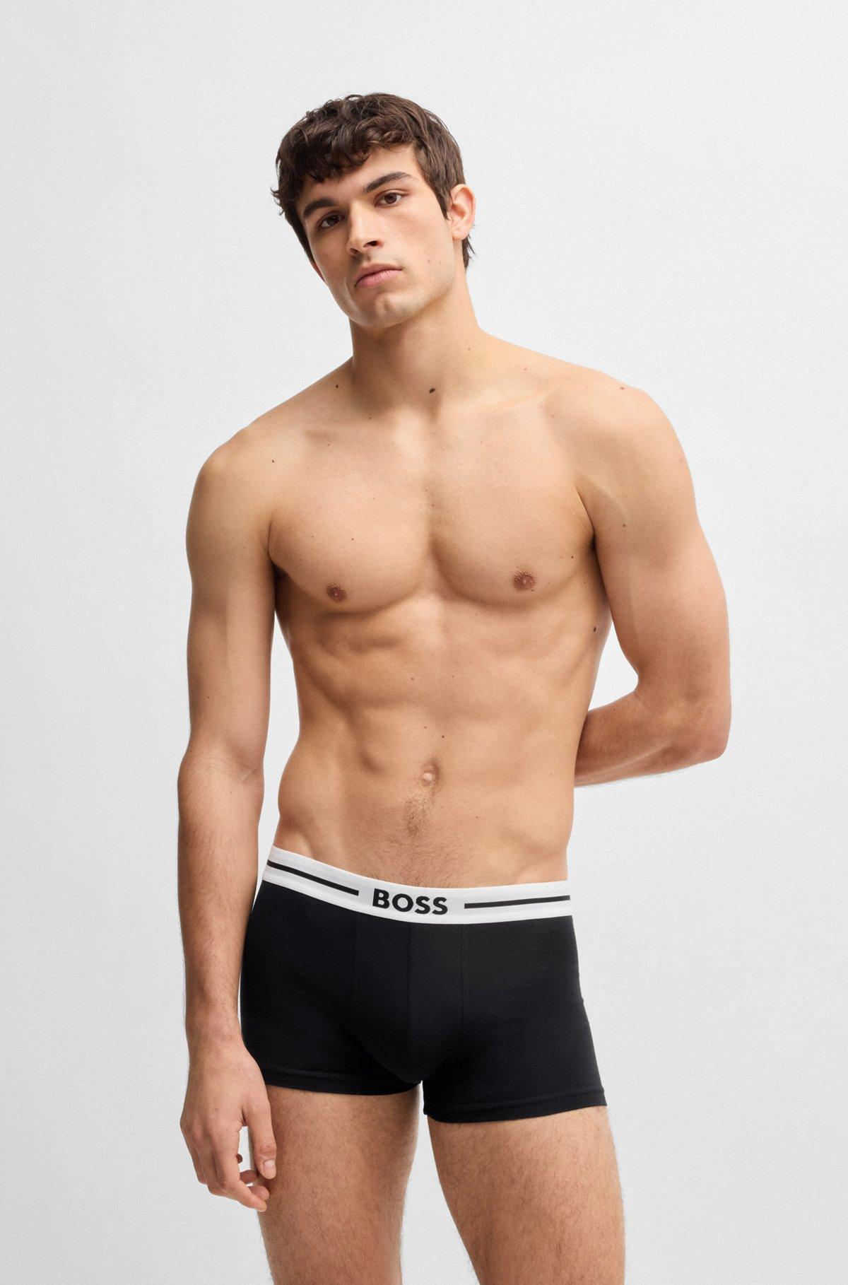 Three-pack of stretch-cotton plain and monogrammed trunks  Product Image