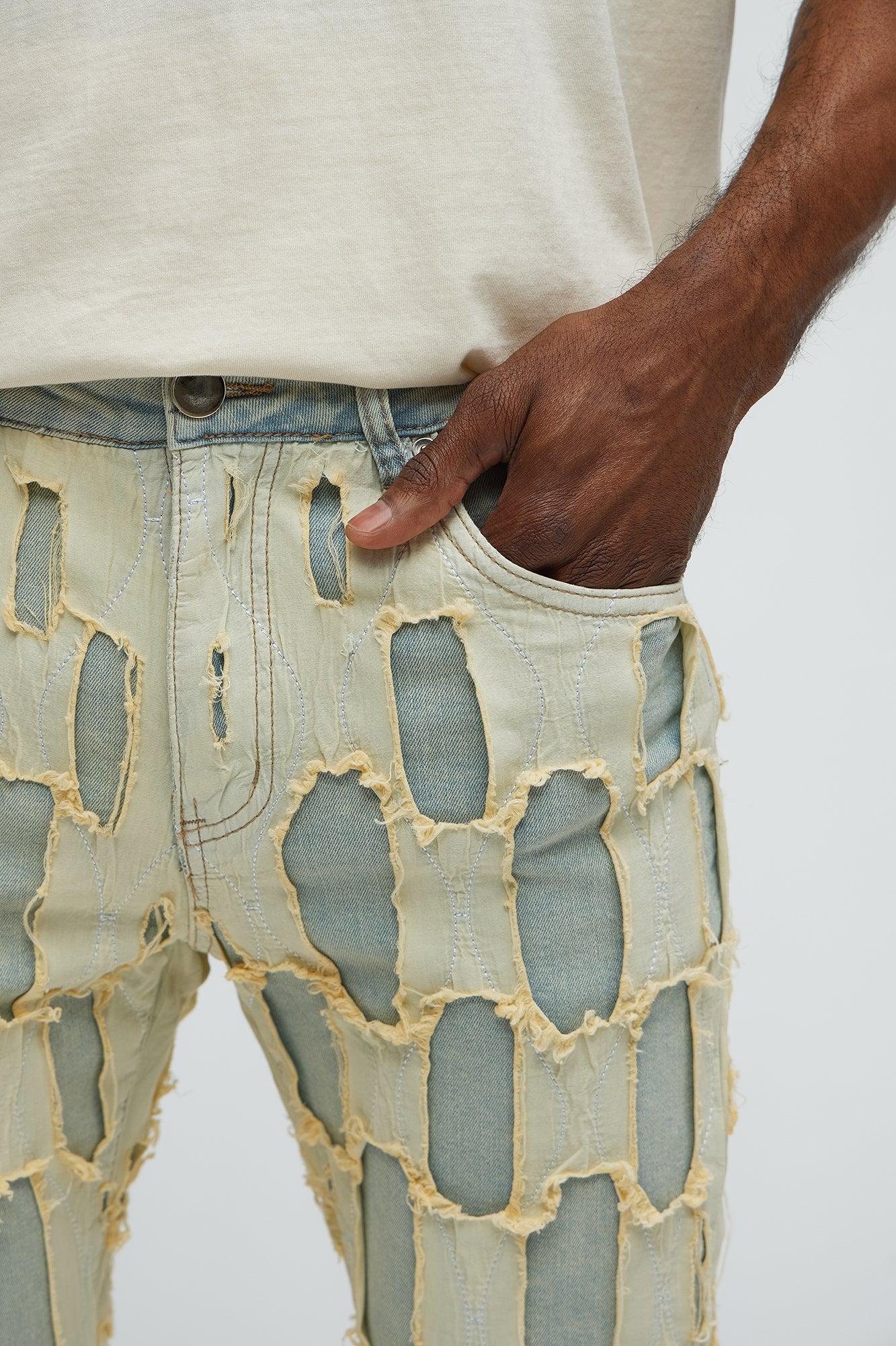 Shredded Distressed Stacked Skinny Flare Jeans - Medium Wash Product Image