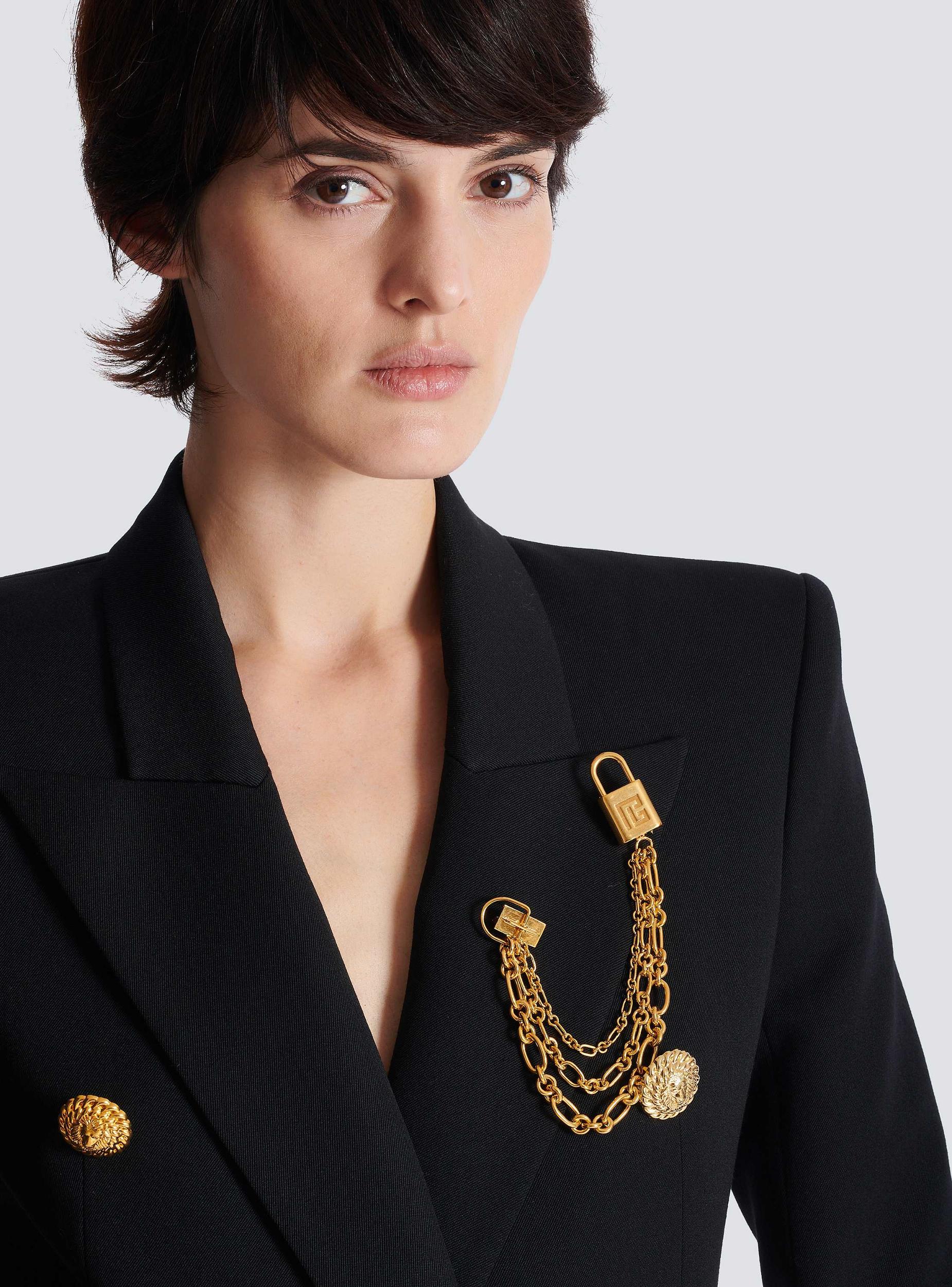 Sync brass brooch with chains Product Image