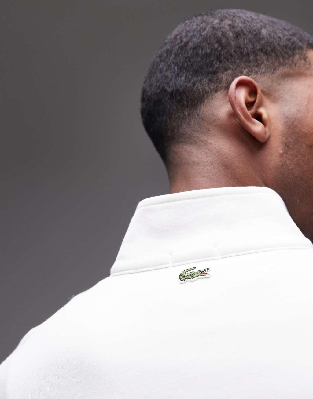 Lacoste half zip sweatshirt in white with chest logo print Product Image