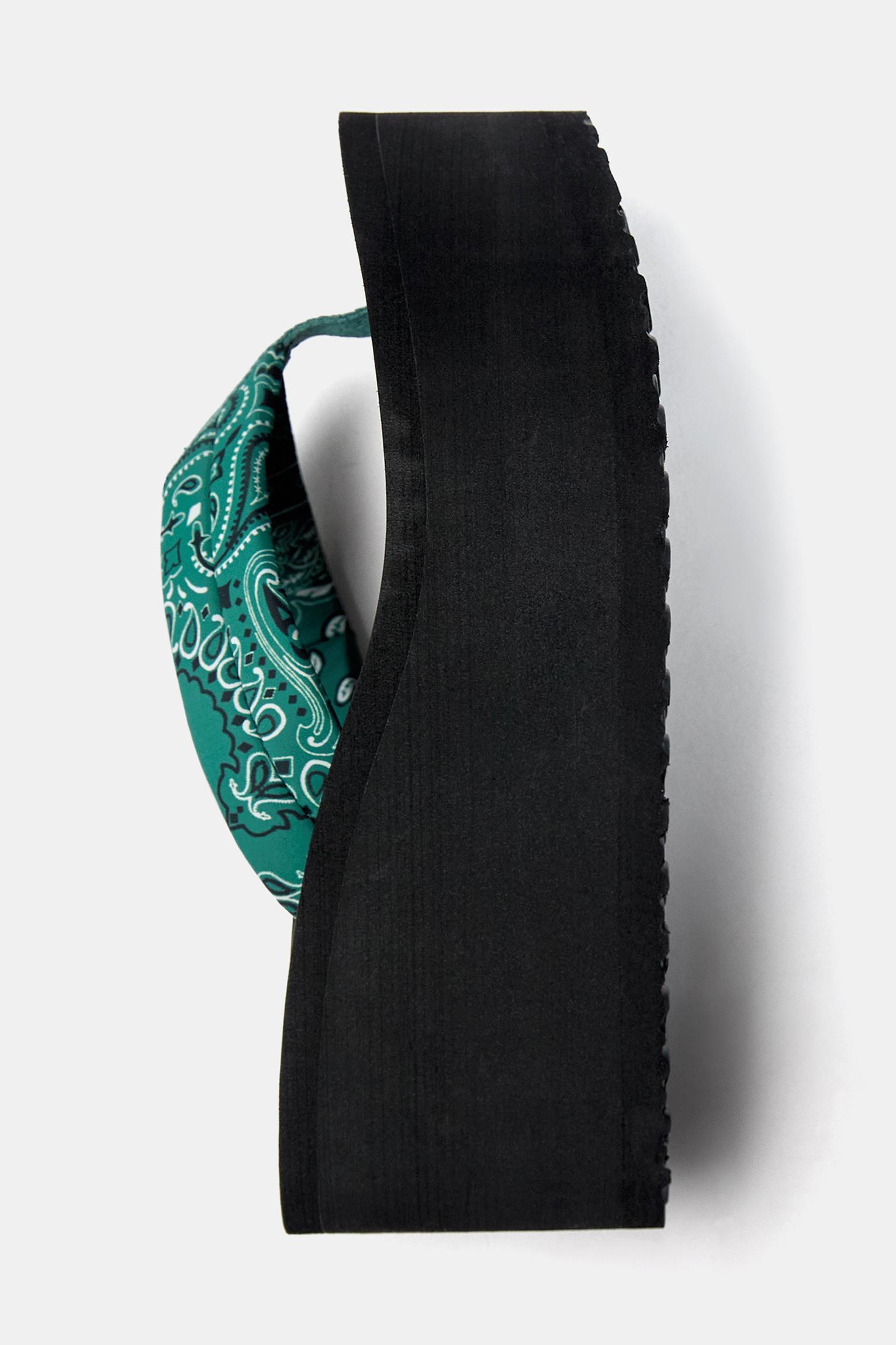 Wedge sandals with detail Product Image