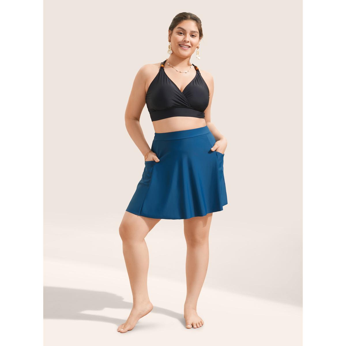 Plus Size Solid Patched Pocket Side Pleated Swim Skirt Women's Swimwear Indigo Beach Non High stretch Bodycon High Rise Slanted pocket Curve Swim Bottoms BloomChic 30/6X Product Image