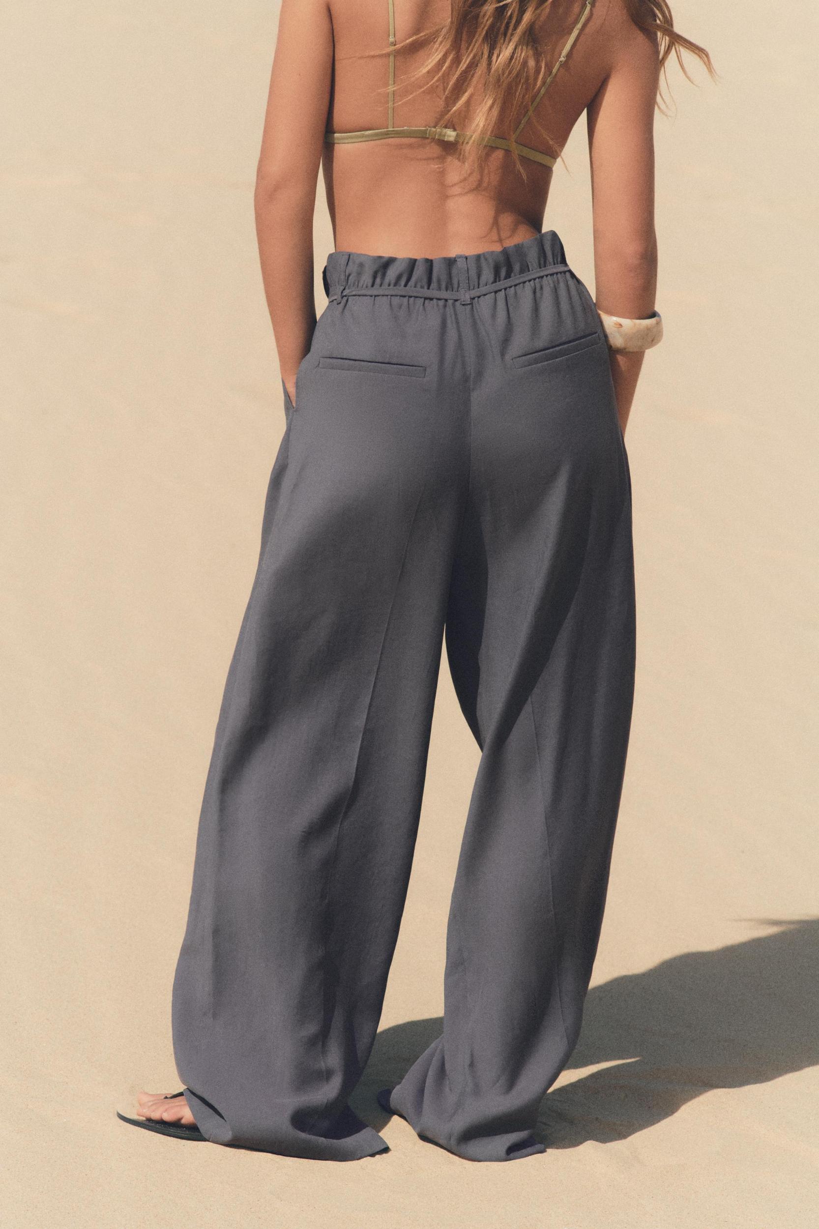 FLOWY PAPERBAG BELTED PANTS Product Image