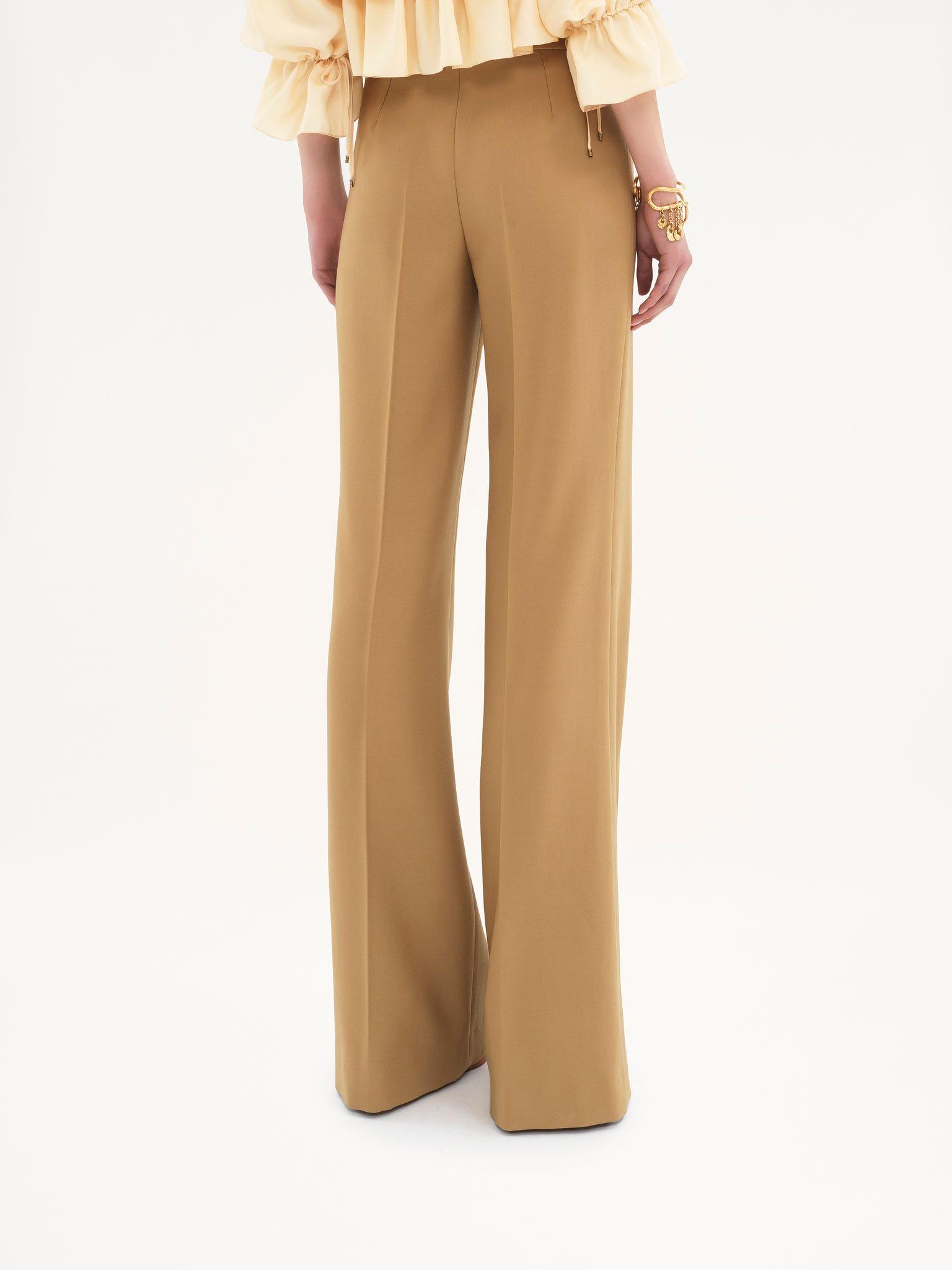 Flared tailored pants in wool grain de poudre Product Image