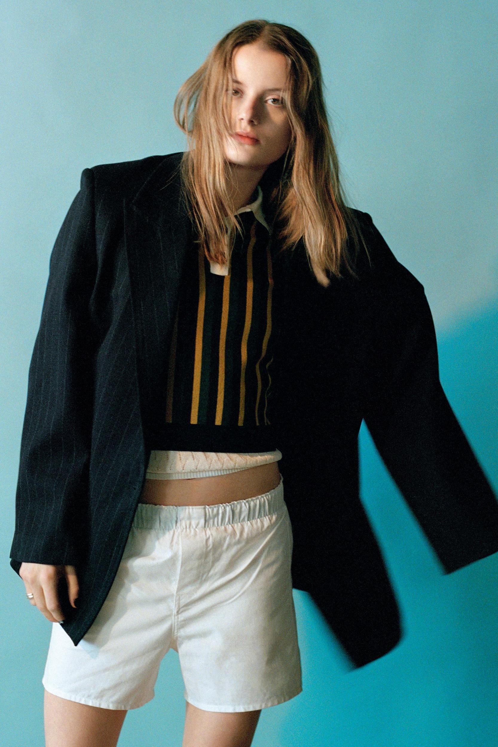 STRIPED KNIT POLO SWEATER Product Image