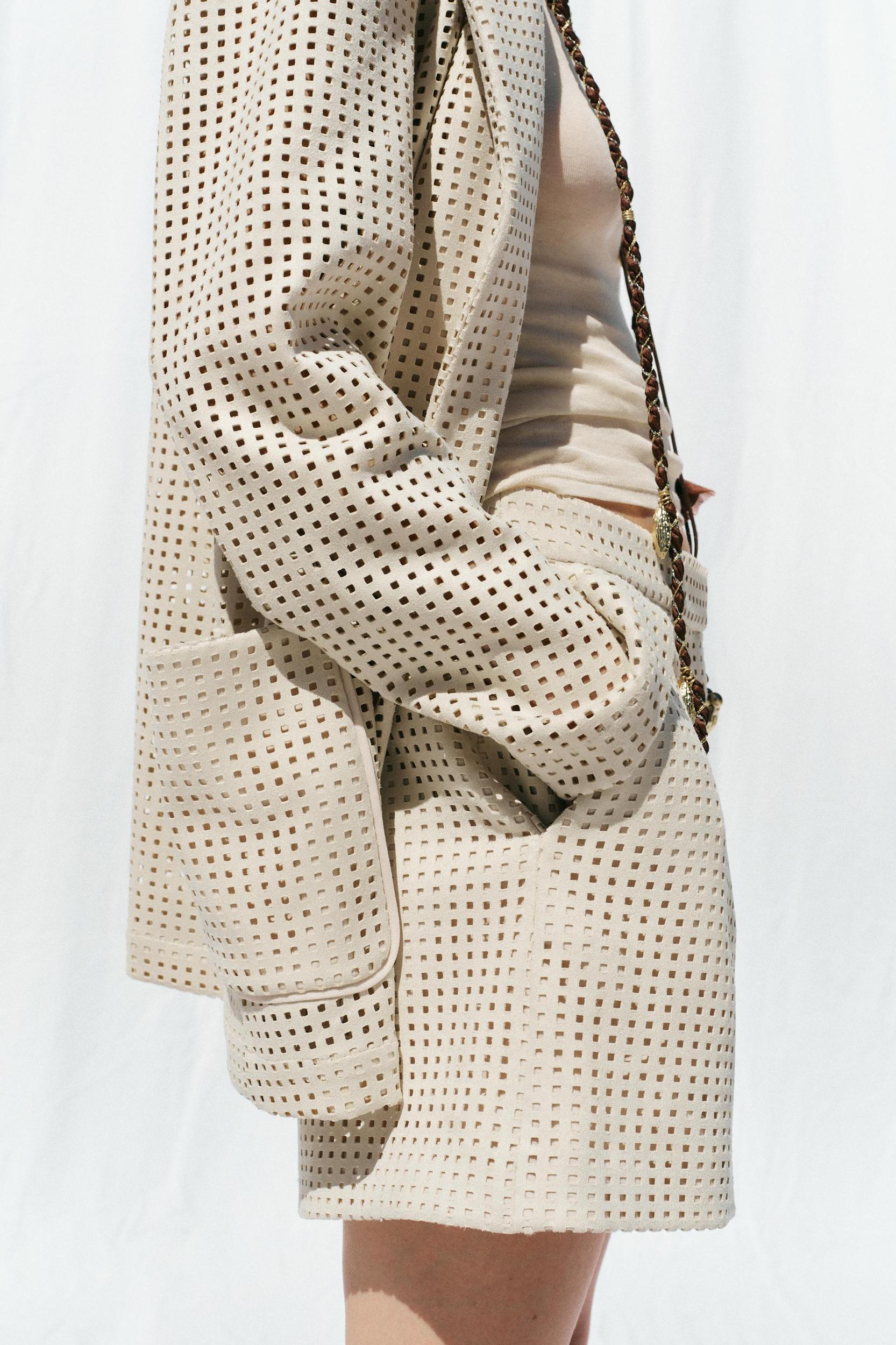 FAUX SUEDE EYELET SHORTS Product Image