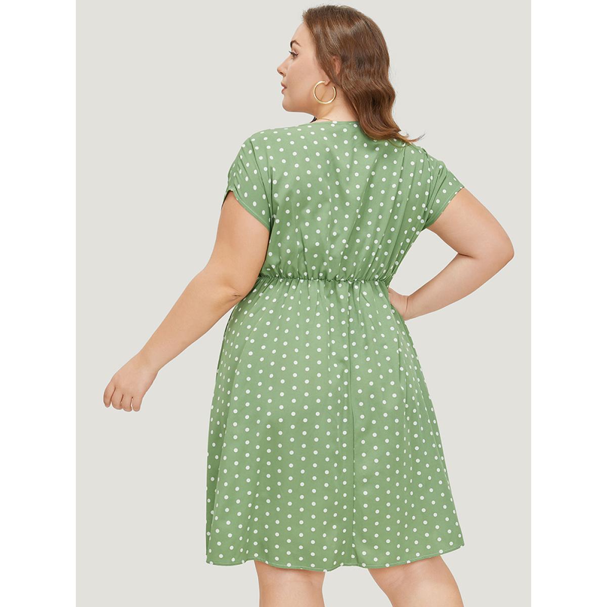 Plus Size Polka Dot Pocket Button Detail Twist Front Knee Dress Green Women Elegant Knotted V-neck Cap Sleeve Curvy Knee Dress BloomChic 14-16/1X Product Image