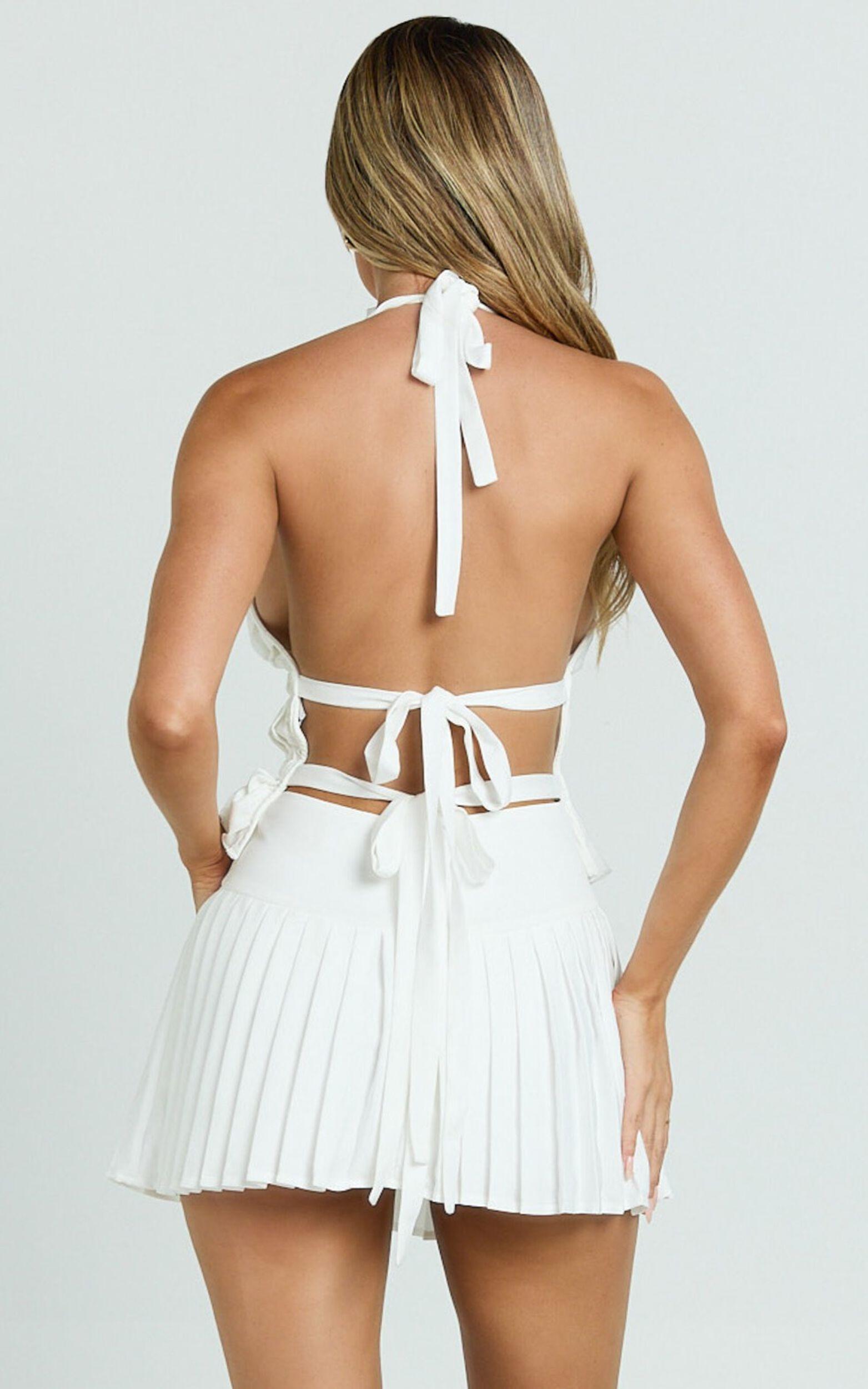 Erica Mini Skirt - Yoke Waist Pocket Detail Pleated Skirt in Off White Product Image