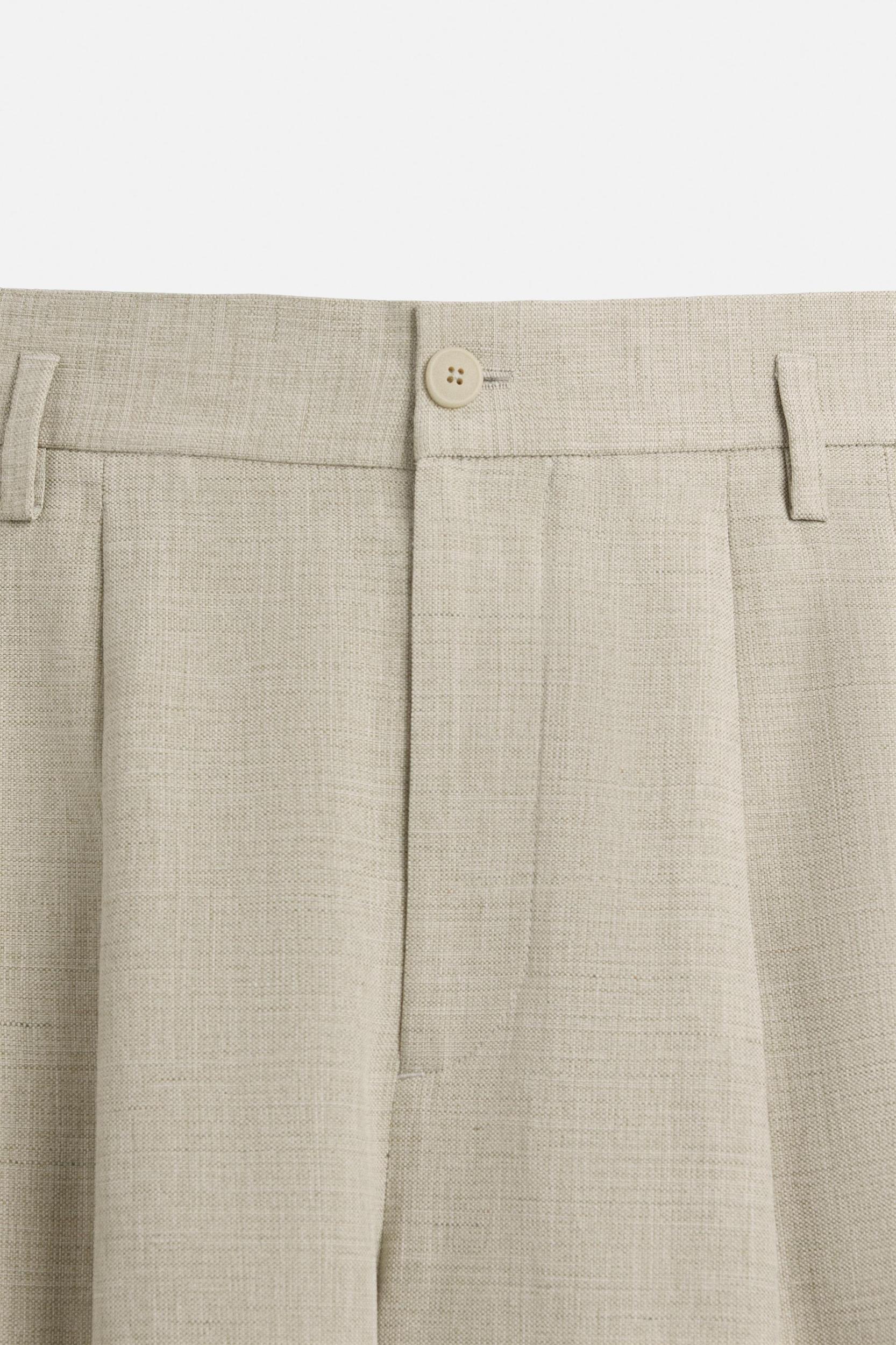 PLEATED WIDE FIT BERMUDA SHORTS Product Image