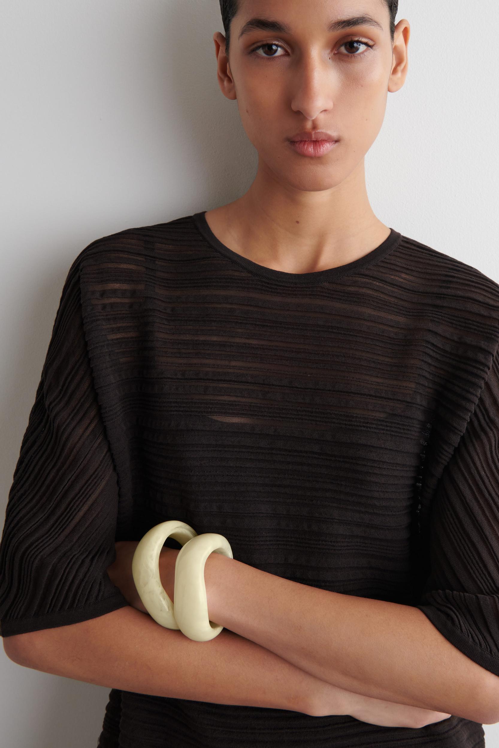 PLEATED KNIT MINI DRESS Product Image