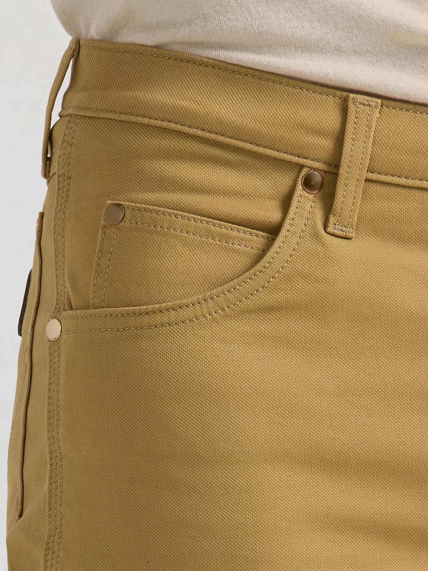 Premium Performance Tough Comfort Cowboy Cut® Regular Fit Canvas Jean | Men's JEANS | Wrangler® Product Image