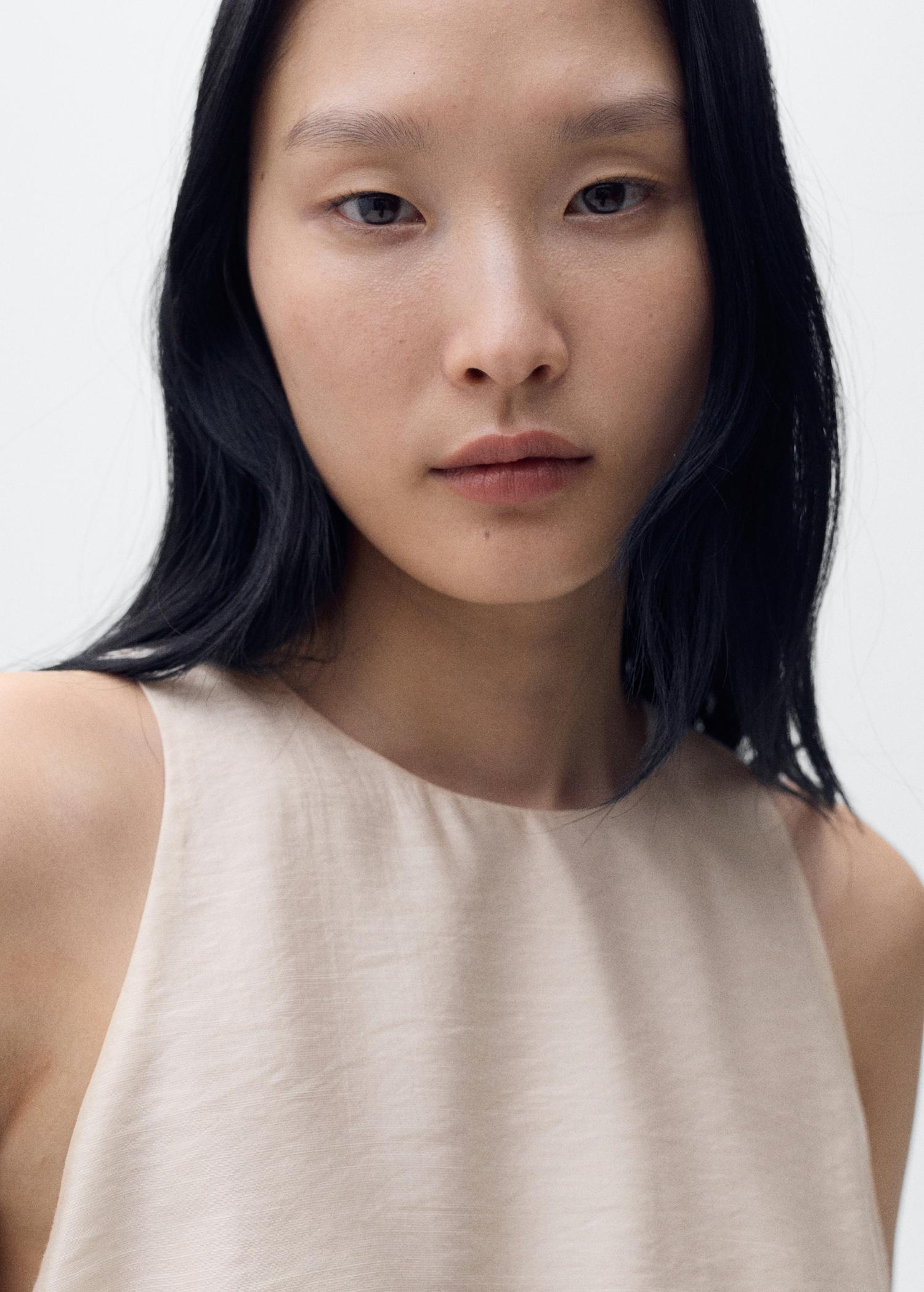 Lyocell-blend top with puffed hem - Women | MANGO USA Product Image