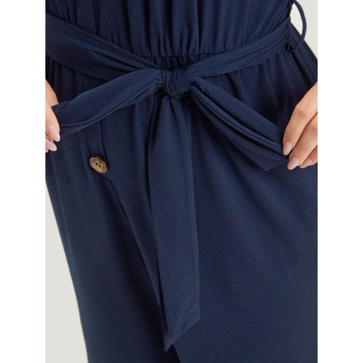 Plus Size DarkBlue Solid Button Up V Neck Belted Gathered Flutter Sleeve Jumpsuit Women Elegant Short sleeve V-neck Dailywear Loose Jumpsuits BloomChic 10/M Product Image