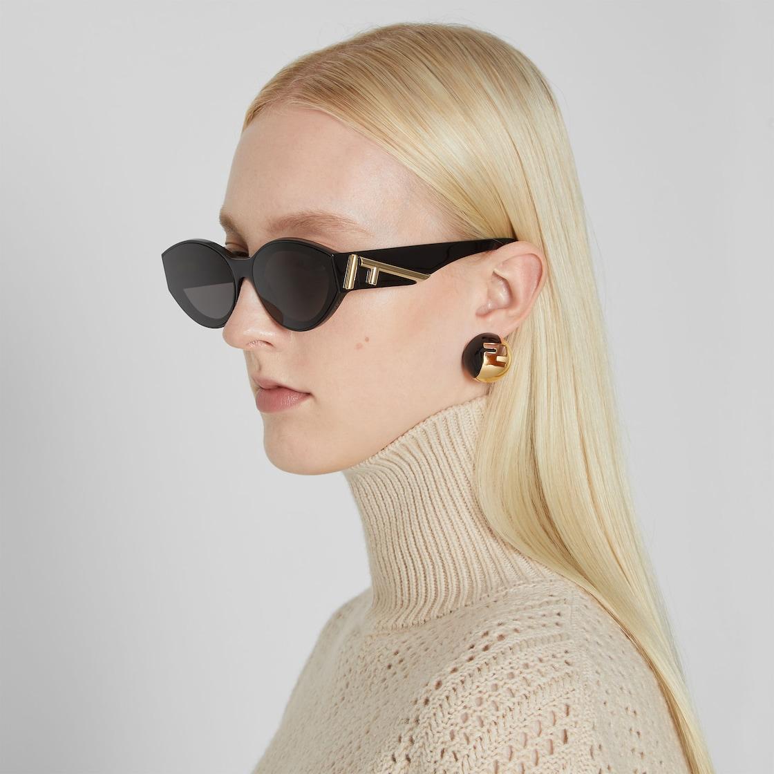 Fendi Sphera EarringsGold and black colored earrings Product Image
