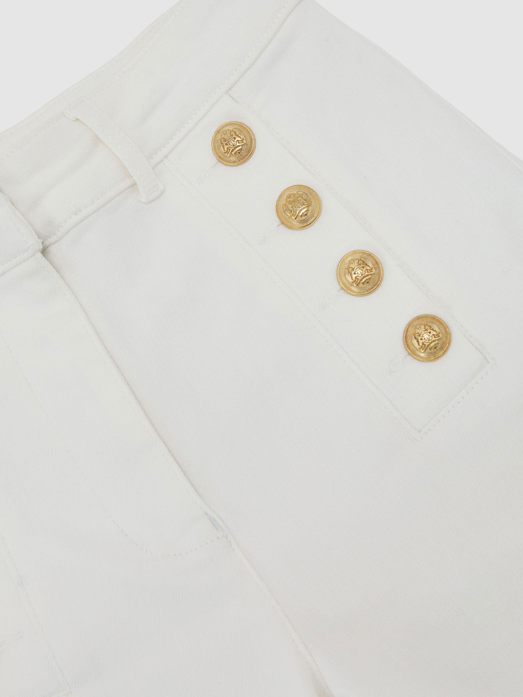 Petite Button-Detail Flared Jeans in White Product Image