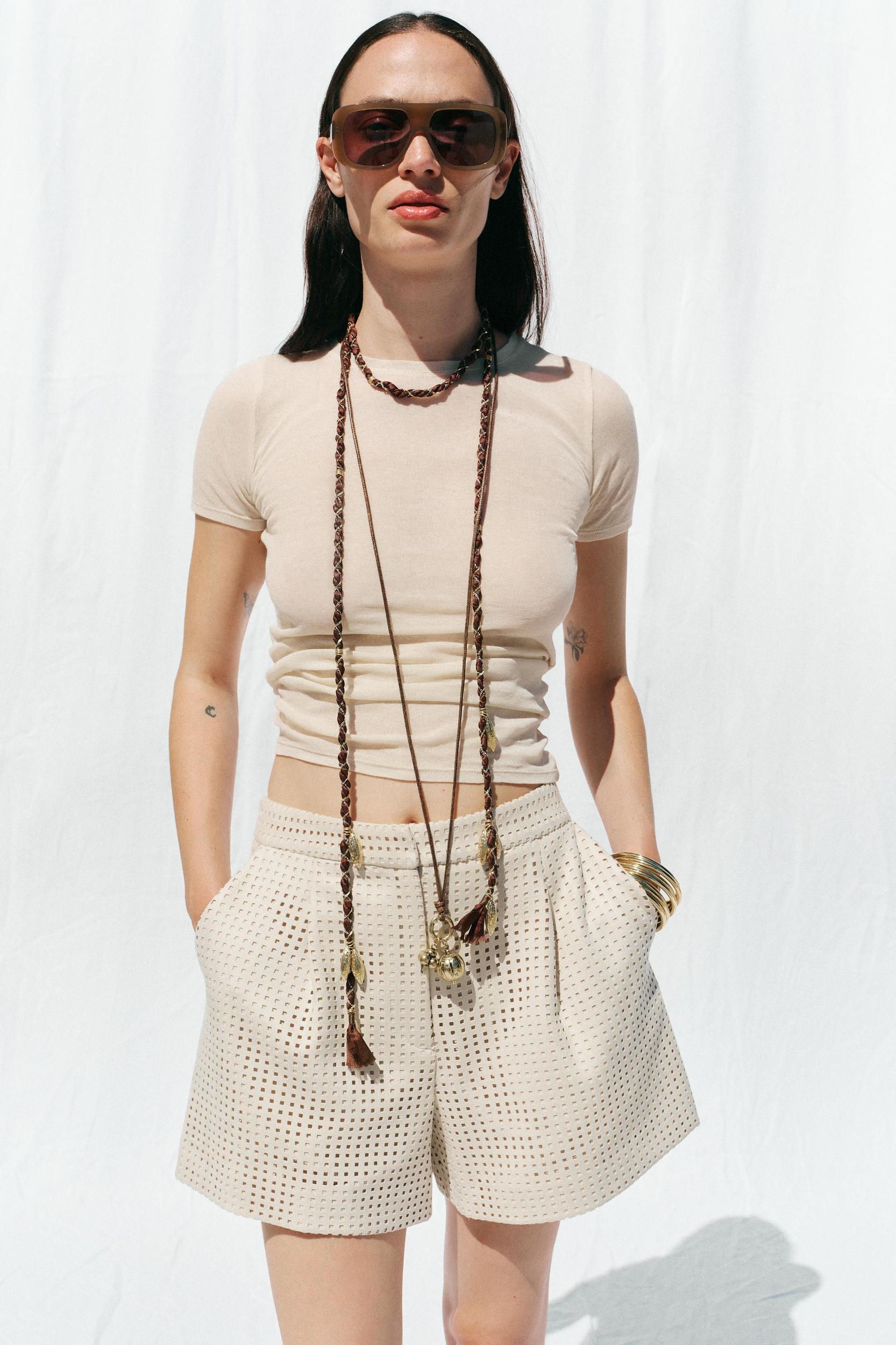 FAUX SUEDE EYELET SHORTS Product Image