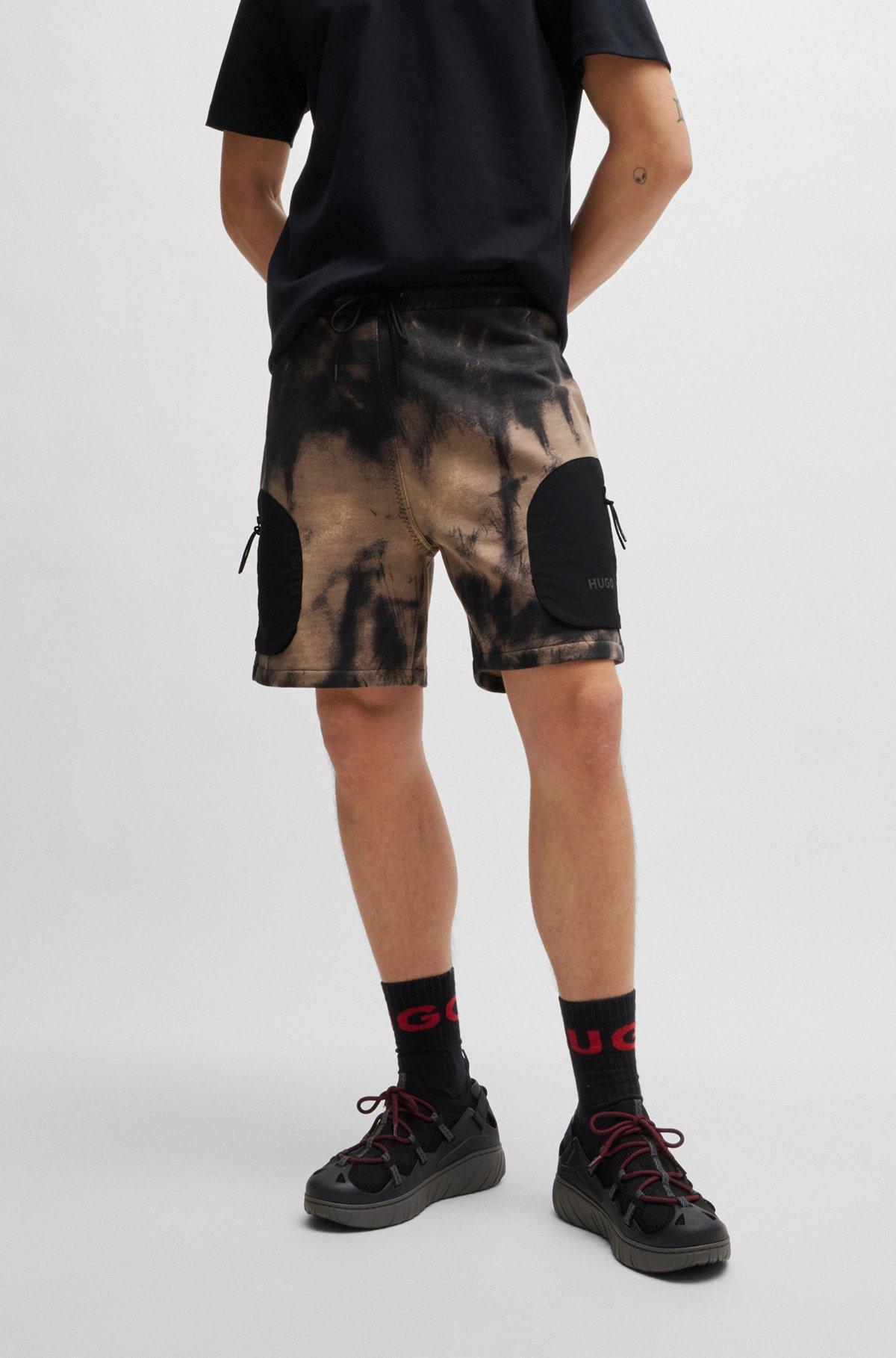 Cotton-terry relaxed-fit shorts with logo print Product Image