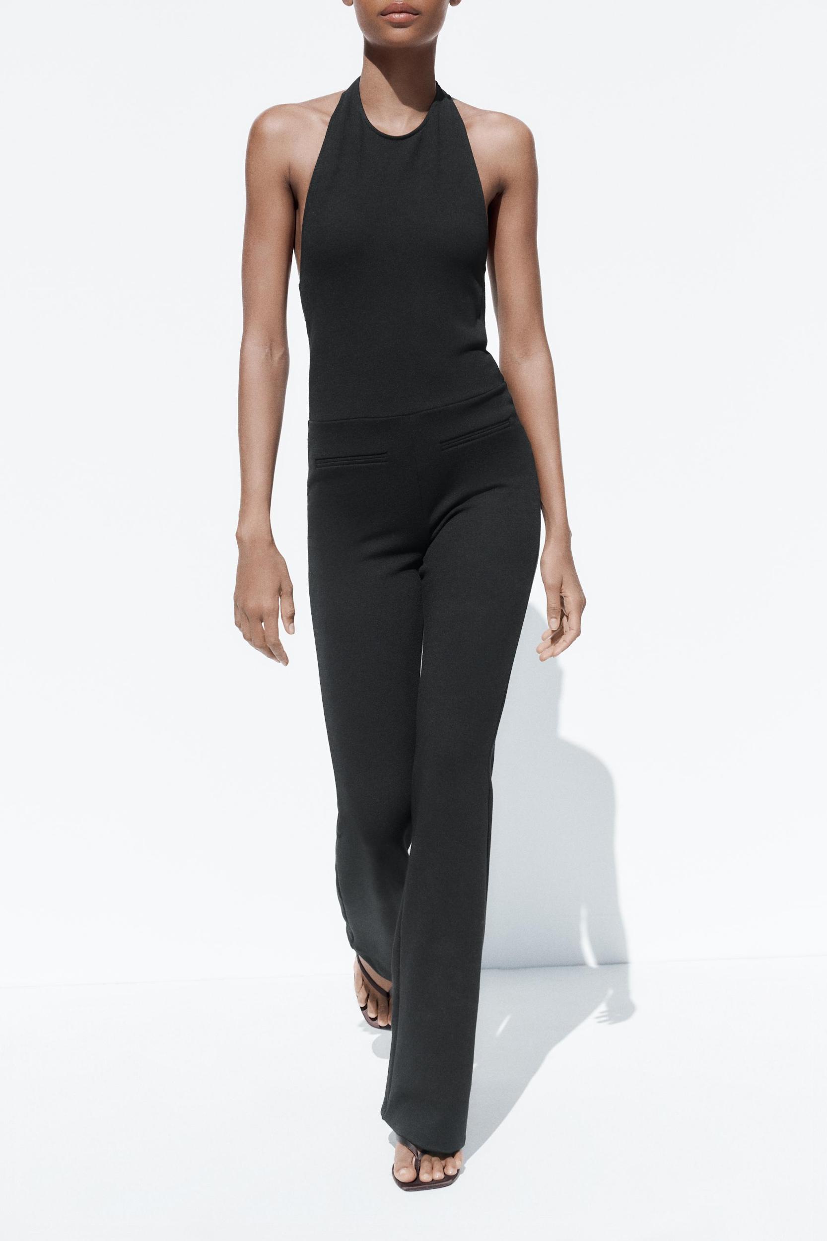 HALTER FLARE STRETCH JUMPSUIT Product Image
