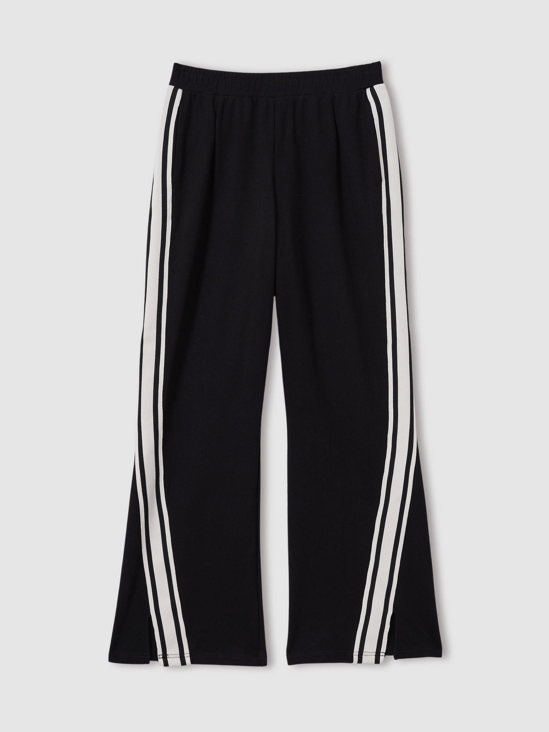 Flared Track Trousers in Black Product Image