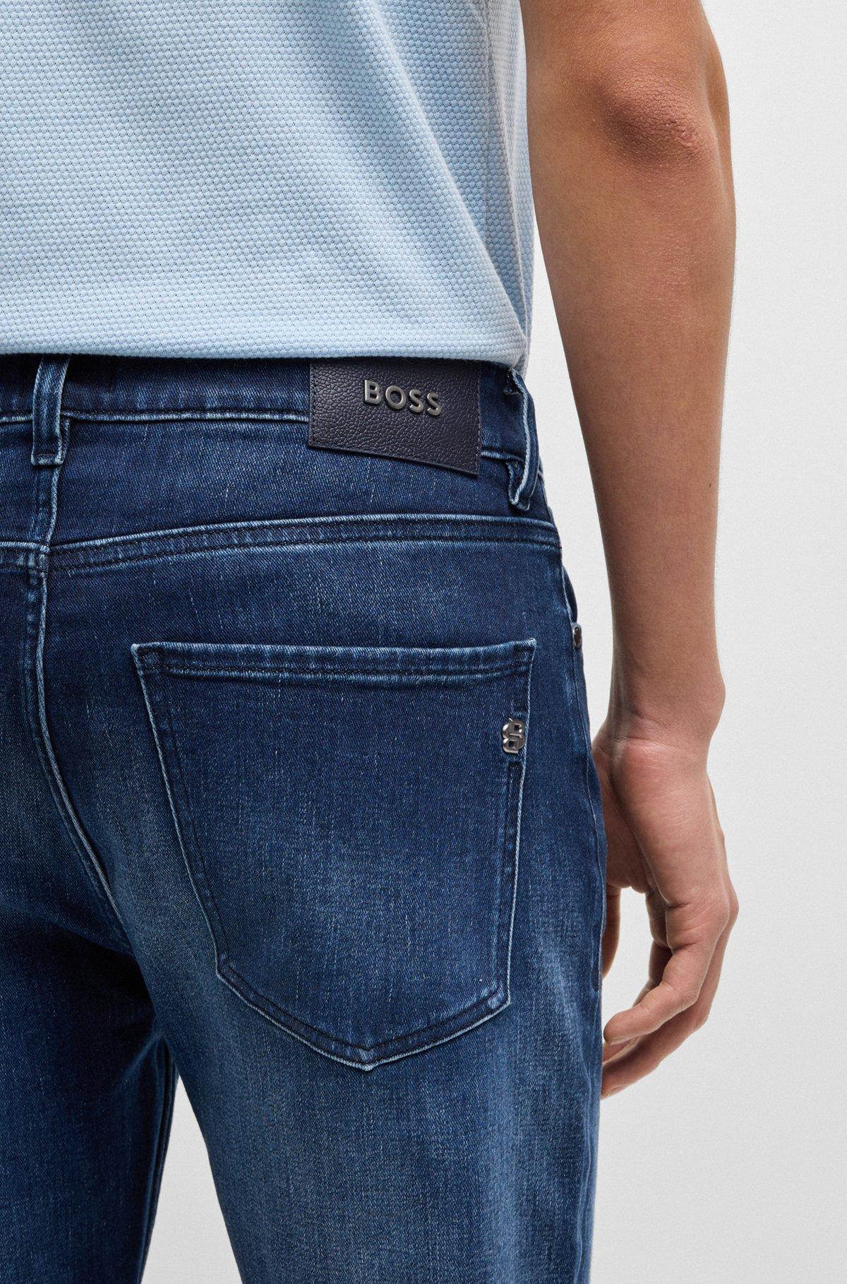 Delaware slim-fit jeans in dark-blue stretch denim Product Image