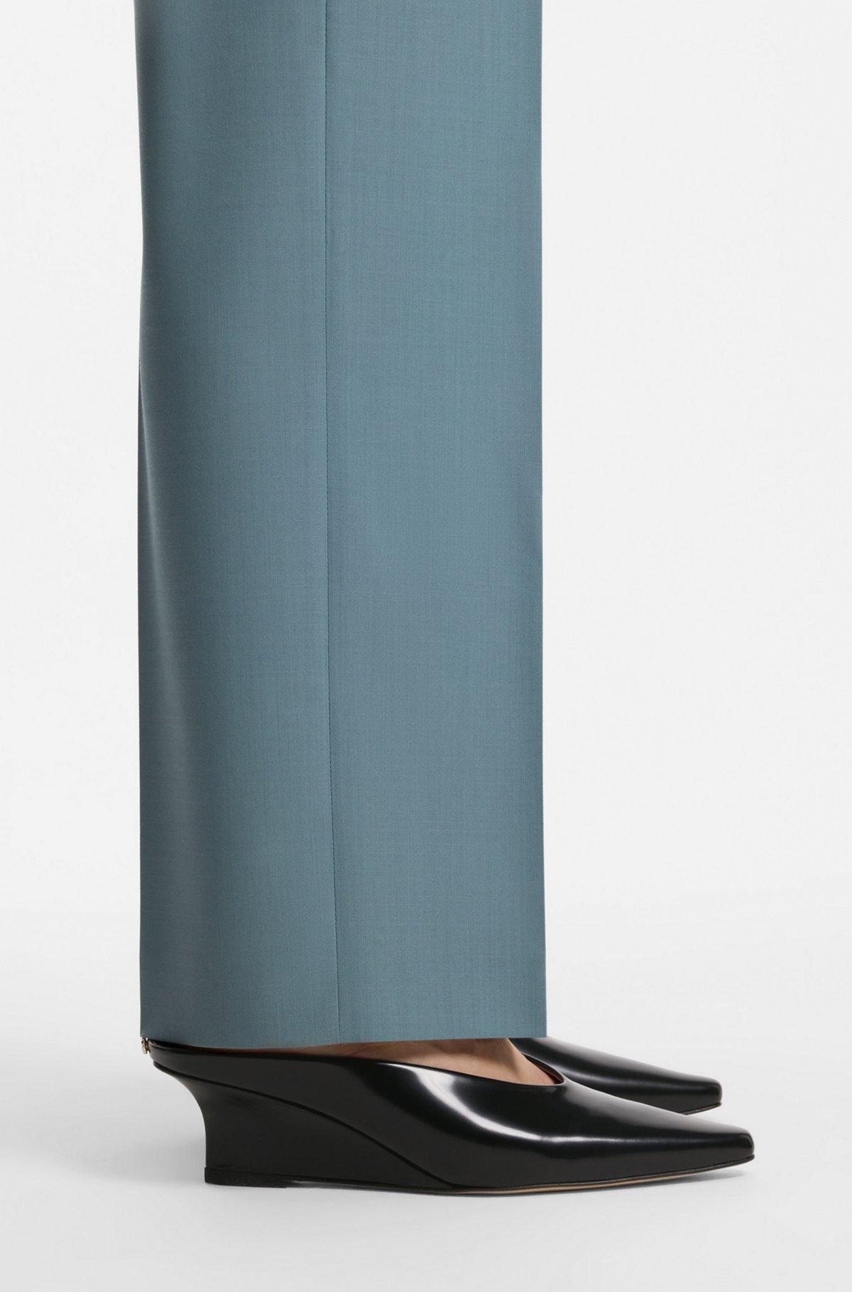 Wedge-heel mules in leather Product Image