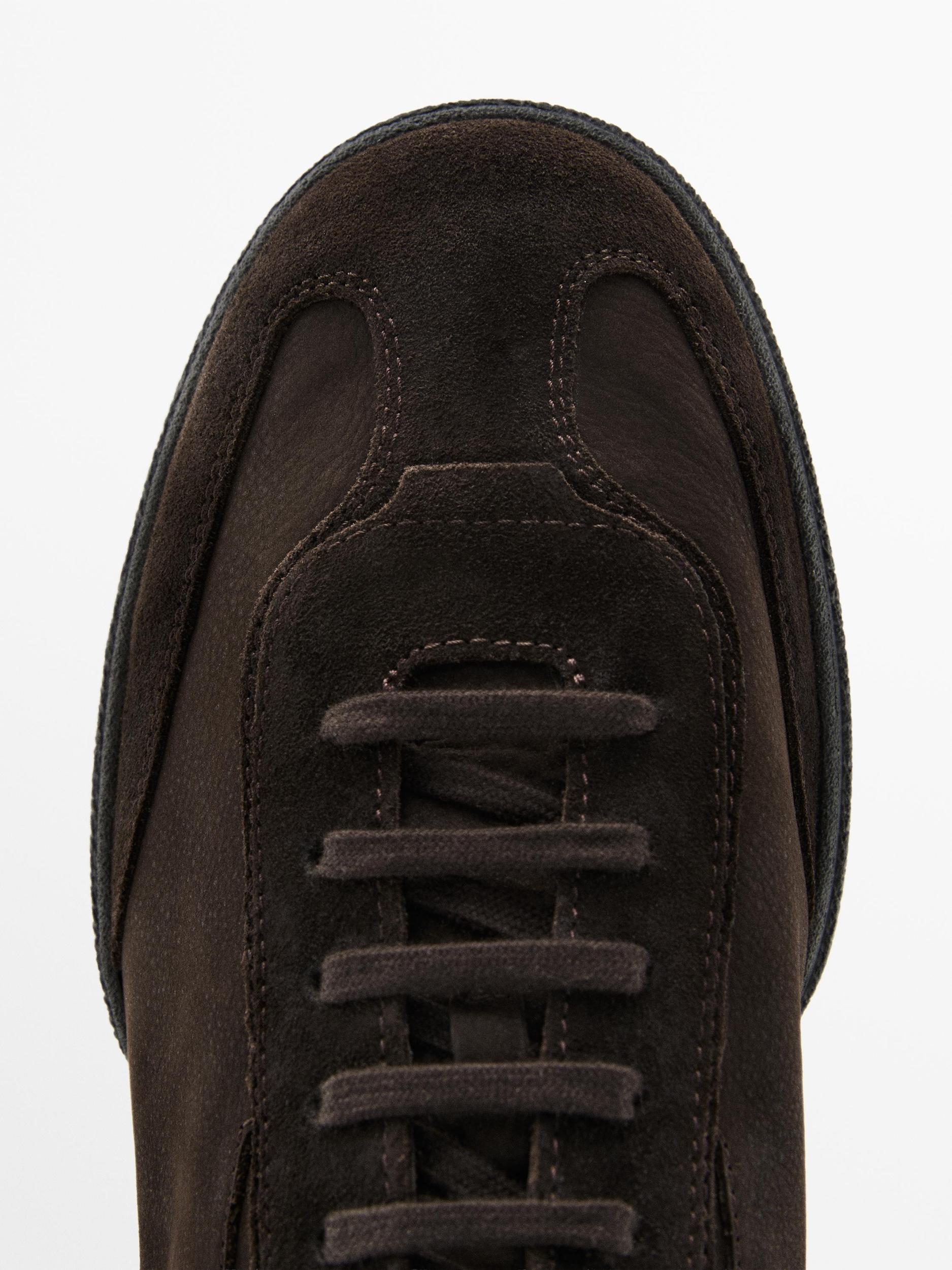 Split leather trainers with contrast soles Product Image
