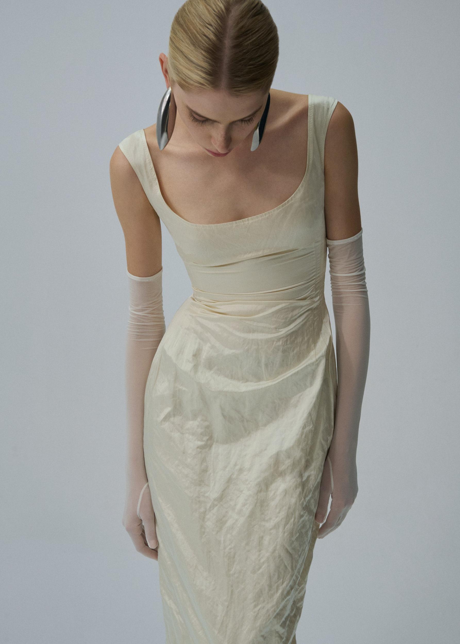 Round neck midi dress in cream Product Image